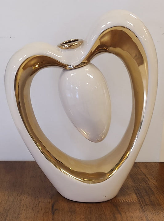 Corazón abstracto blanco y dorado