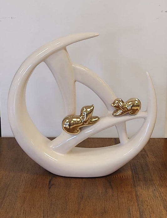 Figura abstracta Conejos beige y dorado